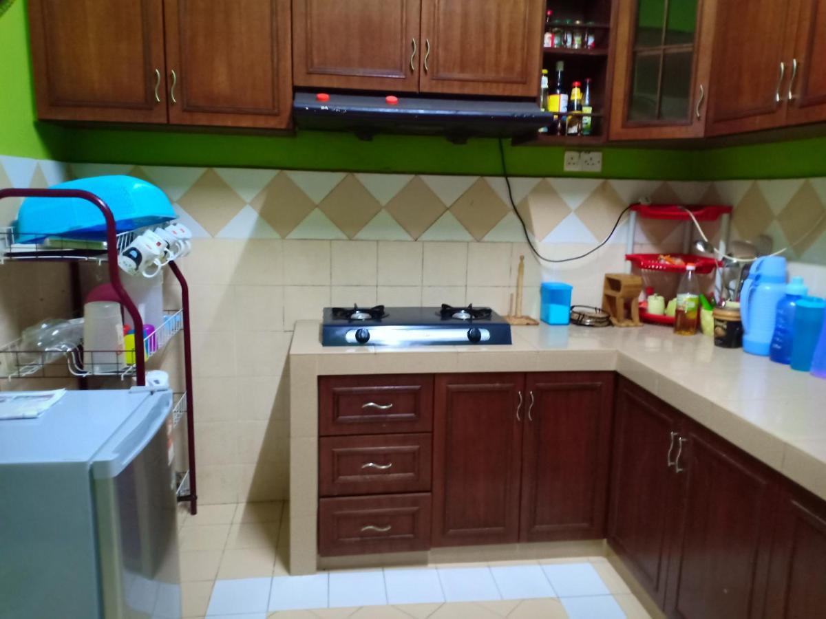 Muslim Dinaim Homestay Tanjong Malim Buitenkant foto